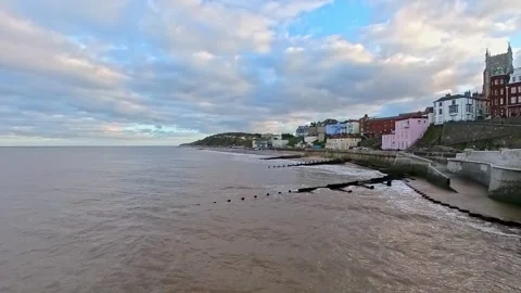 Pull back shot of the seafront and beach in the seaside town of Cromer, Norfolk Video stock 255530752