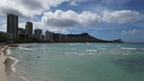 Pull back shot of Waikiki Beach in Oahu Stock Footage 310212936