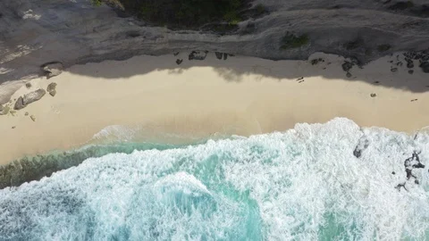Pull Back Spinning Top Down Aerial Shot Of Diamond Beach Thousand Islands at Stock Footage 113880819