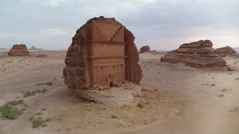 Pull back, Tomb of Lihyan, desert and rock, blue sky. Al Ula. 4K Aerial Stock Footage 196847218