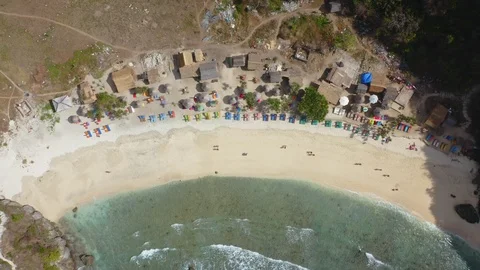 Pull Back Top Down Aerial Shot Of Atuh Beach Thousand Islands at Nusa Penida, Stock Footage 113829693
