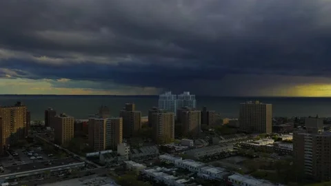Pull Back View of Angry Dark Clouds Over Coney Island in Brooklyn Video stock 130922486