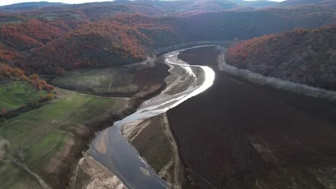 Pull back view of dried up lake surface. 4K Drone Video Video stock 167319608