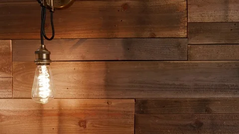 Pull Back as Vintage Modern Wood Wall Light Turns On Stock Footage 76255860