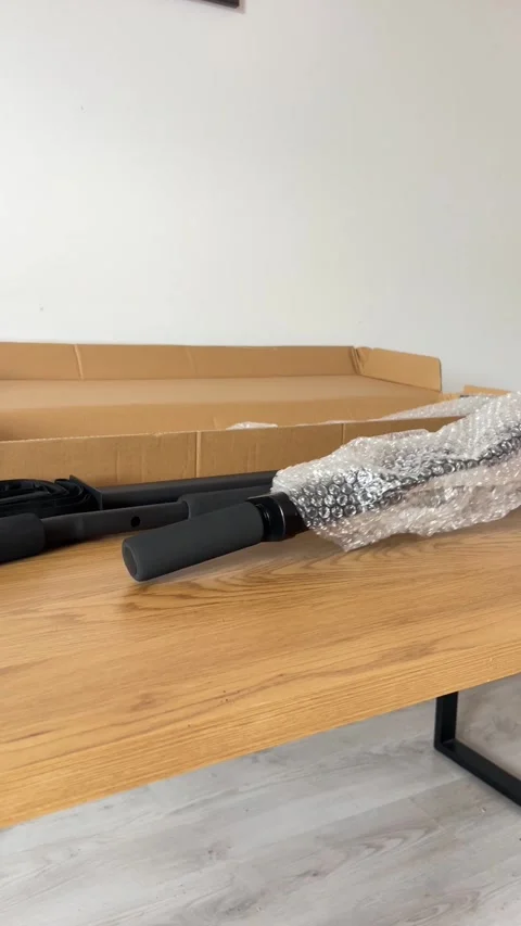 Pull-Up Bar Components in Bubble Wrap Stock Footage 311017499