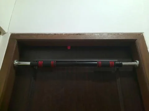 Pull-up bar on a door frame Stock Photos