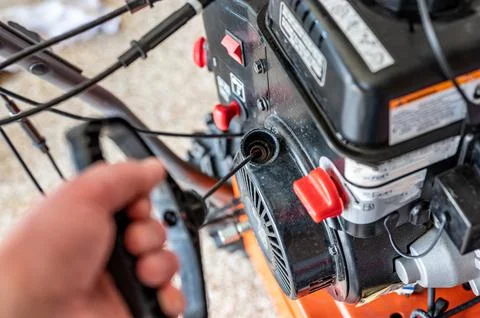 Pull cord to start a portable engine on a snow blower or lawn mower Foto stock