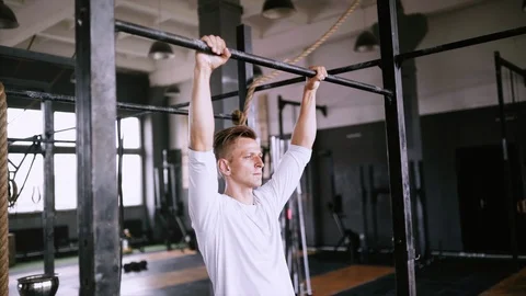 Pull-up exercise in the gym or office for beginners and intermediate. Stock Footage 112016226