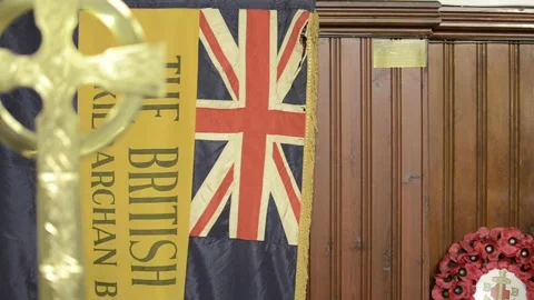 Pull focus from cross to British flag 2 Stock Footage 151230150