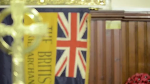 Pull focus from cross to British flag 1 Stock Footage 151230170