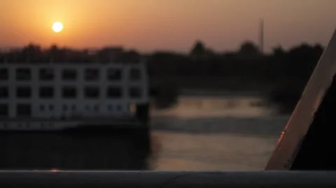 Pull focus to cruise ship on the Nile at sunset 库存影片 64715016