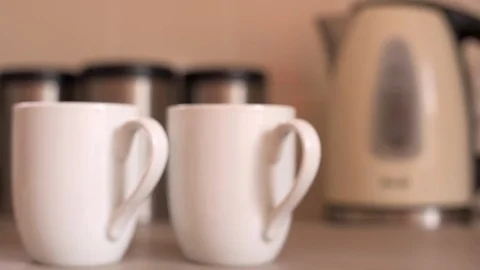 Pull Focus of Cups Stock Footage 94003856