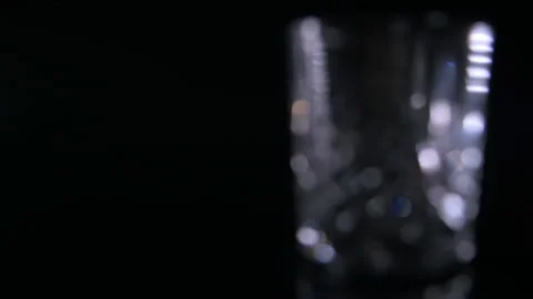 Pull Focus To Empty Traditional Whiskey Glass Stock Footage 140805375