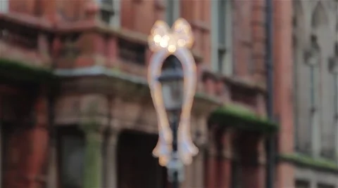Pull Focus Large Bell Twinkling Xmas Lights On Lamppost Birmingham High Street Stock-Footage 44519790