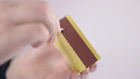 A pull focus of a match being struck and lit Stock Footage 85363453