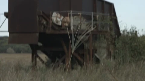 Pull Focus to Overgrown Abandoned Mining Structure Stock Footage 87010913