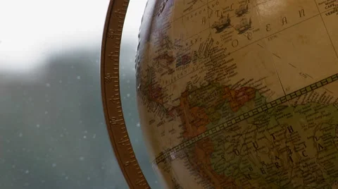 Pull Focus From Rainy Window to Globe Stock Footage 58241409