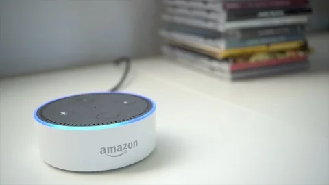 Pull Focus Shot of Amazon Dot Activating Its Light Stock Footage 89621756