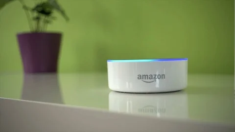 Pull Focus Shot of Amazon Dot Activating Its Light Stock Footage 89624203