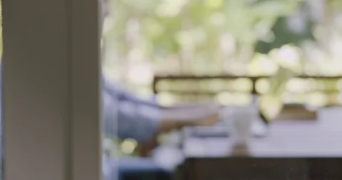 Pull focus shot of man typing on laptop. Stock Footage 120427963