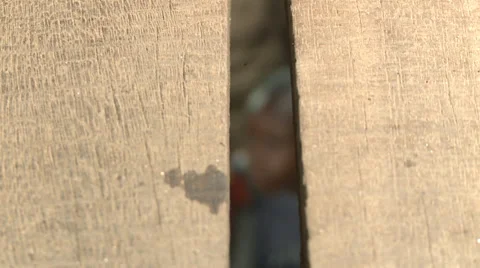 Pull focus, slum school kids through hole in roof Stock Footage 38388096