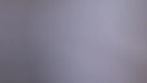 Pull focus onto a stack of hardback text books, CLOSE UP Stock Footage 103150032