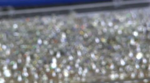 Pull focus on tray packed with 100s diamonds Stock Footage 40061481