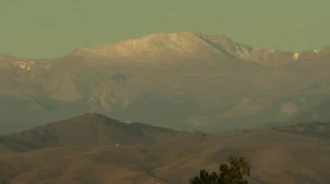 Pull form the Mountains to Downtown Denver Stock Footage 10915928