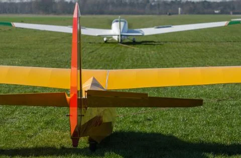 Pull up a glider by a motorized airplane Stock Photos