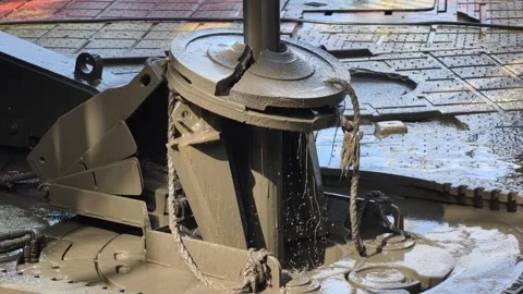 Pull of of hole drill string with oil based mud on the rig floor. Stock Footage 323360438