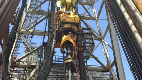 Pull of of hole drill string with oil based mud on the rig floor. Stock Footage 340932001