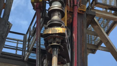 Pull of of hole drill string with oil based mud on the rig floor. Stock Footage 340932731