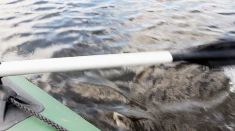 To pull the oars in the water Stock Footage 64104391