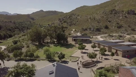 Pull-out aerial drone shot of summer camp, South Africa Stockbeeldmateriaal 157314336
