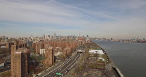 Pull Out Aerial of New York City Midtown with Empire State and East River Stock Footage 68998432
