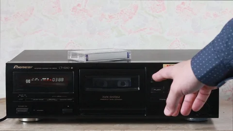 Pull out the audio cassette Stock Footage 88989169