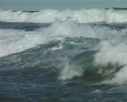 Pull out from Waves Crashing to Beach in Ballito, South Africa GFSD Stock Footage 10678111