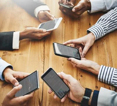 Pull out your phone instead of stacks of paperwork. a group of unrecognisable Stock Photos