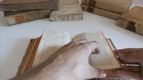 Pull the pages of an old book Stock Footage 53516104