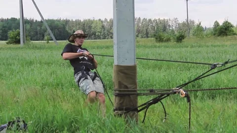 Pull the rope in the summer to jump Stock Footage 130737209