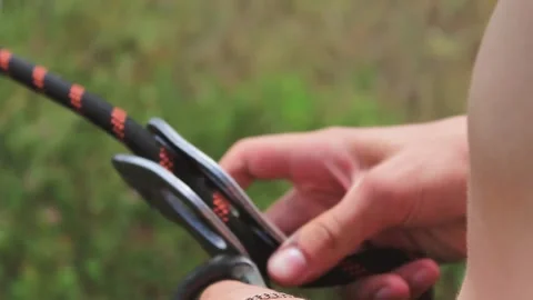 Pull the rope in the summer to jump Stock Footage 130737294