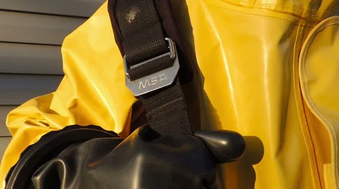 Pull the shoulder strap protective suit, chemical biological protection Stock Footage 49071247
