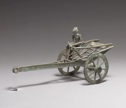 Pull Toy of a Cart and Driver ca. 15th century Indonesia (East Java) Bronze.. Photos