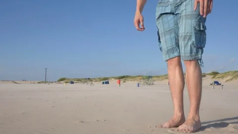 Pull-ups - man fitness model training on the beach outdoors. Video stock 84042002