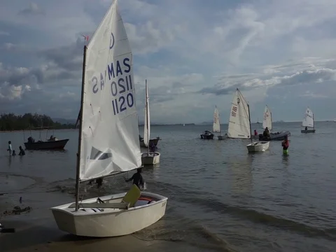 Pull yacht to shore Stock Footage 124830609