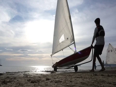 Pull yacht to shore Stock Footage 124830756