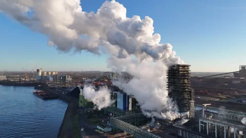 Pullback above river opening the smoking plant scene Stock Footage 331204093