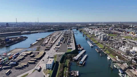 Pullback aerial revealing full Duisport terminal complex Stock Footage 331896814
