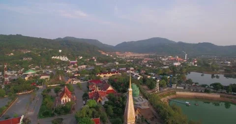 Pullback Aerial Shot Revealing Buddhist Temple in Phuket Stock-Footage 65709976