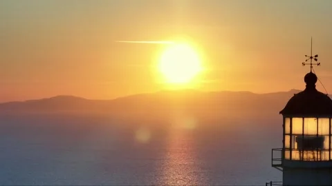 Pullback Drone Reveal of Armenistis Lighthouse in Mykonos During Sunset Stock-Footage 318403751